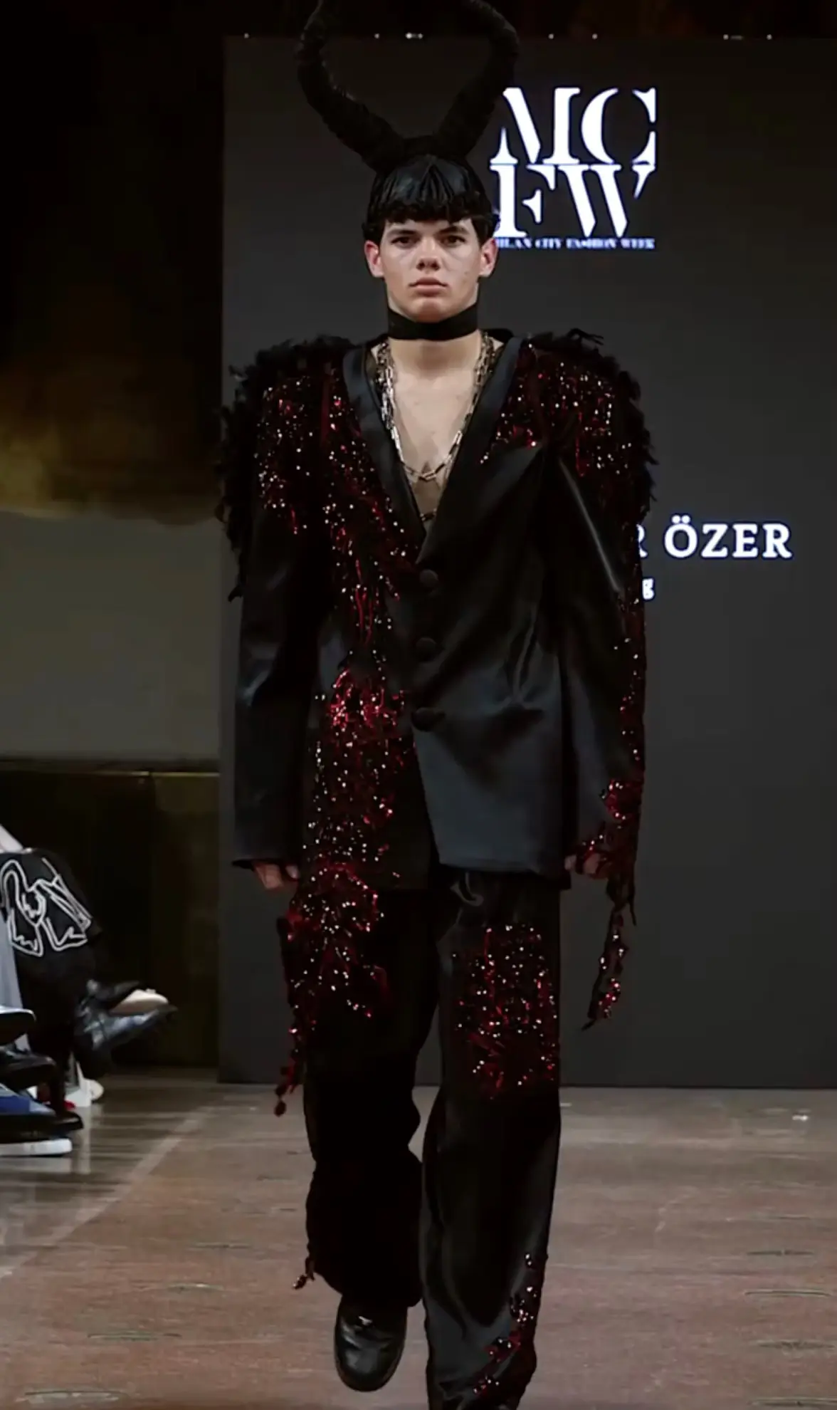 Angels Never Die collection runway look in black and red